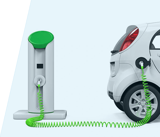 A white car is plugged into an electric vehicle charger.